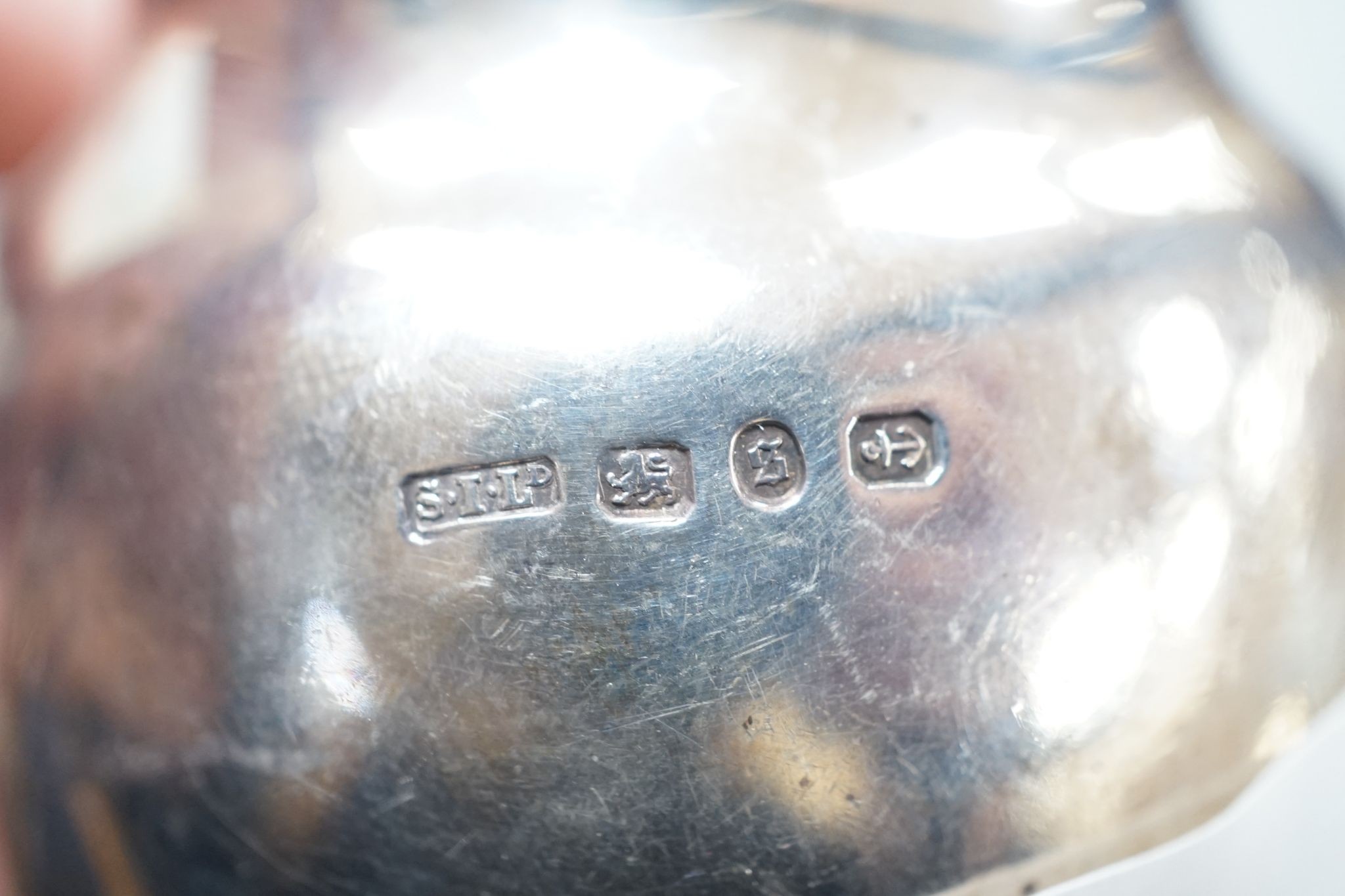 A late Victorian silver helmet shaped cream jug, Birmingham, 1892, 95mm, 113 grams.